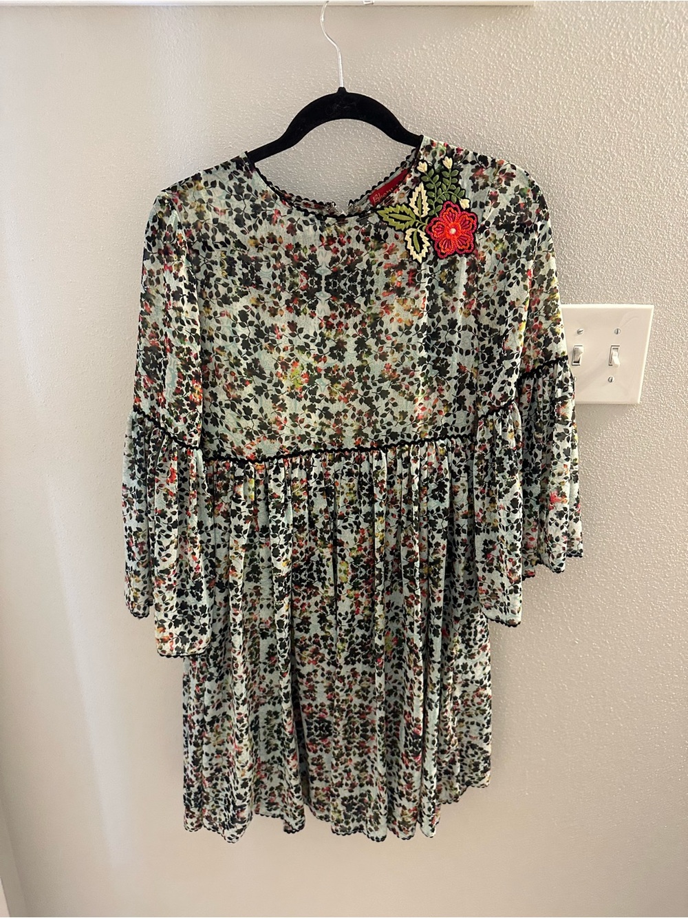 Floral women’s babydoll Dress with Red Flower Accent